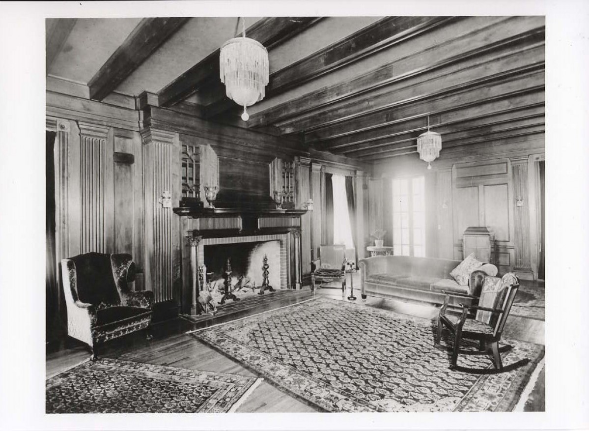 old black and white photo of the wood paneled drawing room
