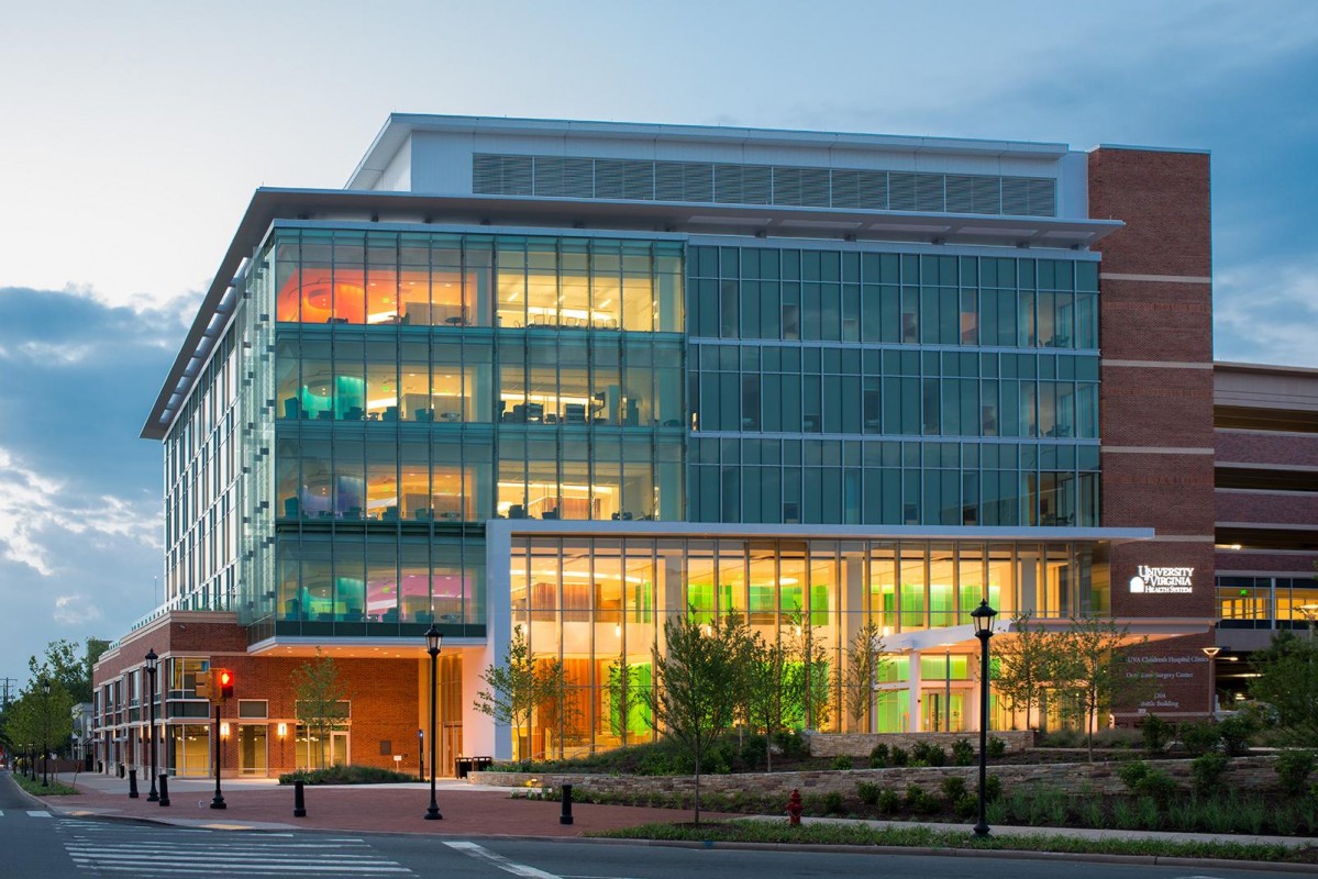 Exterior of a colorfully light multi story building 